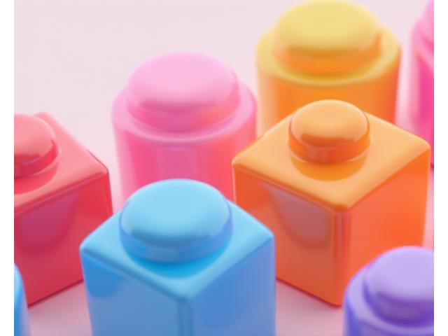 Vibrant, abstract shapes on a tablet screen, representing sensorial learning through color and form.